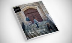 University of Guelph Legacy Brochure Cover featuring Alumni in Jackets Climbing Stairs of Historical Building