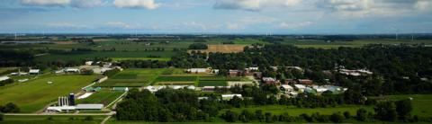 Drone view of the University of Guelph Ridgetown campus surrounded by farm fields.